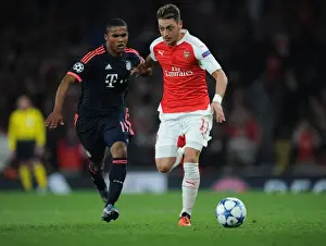 Mesut Ozil Breaks Past Douglas Costa: Arsenal FC vs. FC Bayern Munchen, UEFA Champions League, 2015