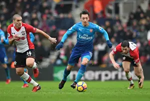 Southampton V Arsenal 2017-18 Prints: Mesut Ozil Clashes with Hojbjerg and Romeu in Southampton vs Arsenal Premier League Showdown