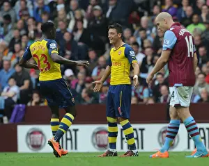 Aston Villa V Arsenal 2014-15 Prints: Mesut Ozil and Danny Welbeck Celebrate Arsenal's First Goal Against Aston Villa (2014-15)