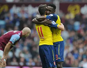Mesut Ozil and Dany Welbeck Celebrate Arsenal's First Goal vs. Aston Villa (2014-15)