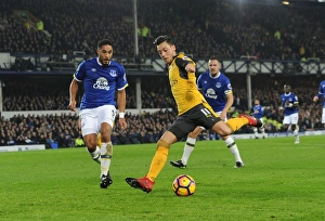 Everton V Arsenal 2016-17 Prints: Mesut Ozil Faces Ashley Williams: Everton vs. Arsenal, Premier League 2016-17