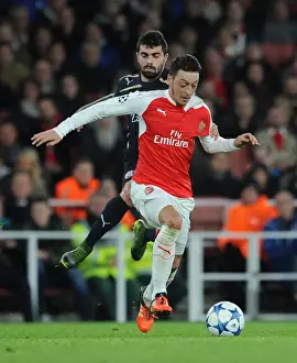 Arsenal V Dinamo Zagreb 2015-16 Prints: Mesut Ozil Faces Intense Pressure from Paulo Machado in Arsenal's Champions League Clash against Dinamo Zagreb