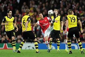 Arsenal V Borussia Dortmund 2013-14 Prints: Mesut Ozil Faces Off Against Sven Bender and Henrikh Mkhitaryan: Arsenal vs Borussia Dortmund