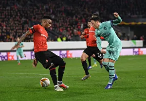 Stade Rennes V Arsenal 2018-19 Prints: Mesut Ozil Faces Pressure: Arsenal vs