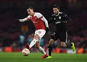 Arsenal V Qarabag 2018-19 Prints: Mesut Ozil Fends Off Abdellah Zoubir: Arsenal vs Qarabag, UEFA Europa League