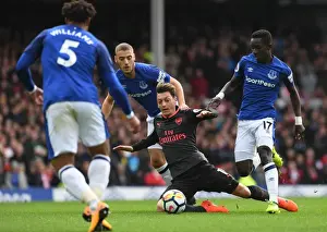 Everton V Arsenal 2017-18 Prints: Mesut Ozil Fouled by Idrissa Gueye and Nikola Vlasic in Everton vs Arsenal Premier League Clash