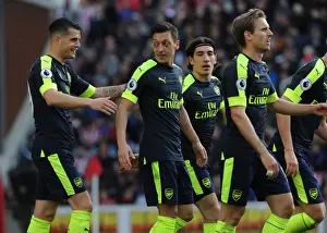 Stoke City V Arsenal 2016-17 Prints: Mesut Ozil and Granit Xhaka Celebrate Arsenal's Goals Against Stoke City