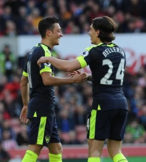Images Dated 13th May 2017: Mesut Ozil and Hector Bellerin Celebrate Arsenal's Second Goal vs Stoke City (2016-17)