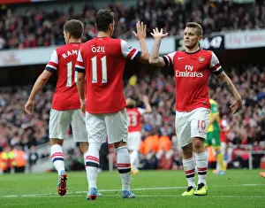 Mesut Ozil and Jack Wilshere Celebrate Goals: Arsenal's Dominance Over Norwich City (2013-14)