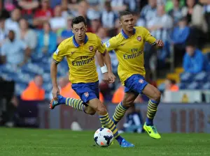 West Bromwich Albion V Arsenal 2013-14 Prints: Mesut Ozil and Kieran Gibbs of Arsenal Facing Off Against West Bromwich Albion (2013-14)