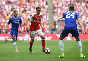Arsenal V Chelsea - FA Cup Final 2017 Prints: Mesut Ozil Lifts FA Cup: Arsenal's 2-1 Victory over Chelsea at Wembley, May 27, 2017