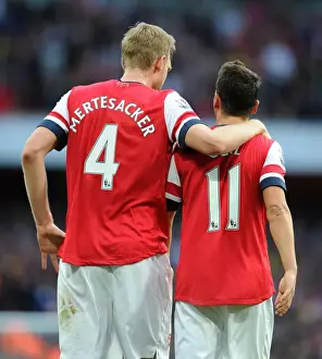 Arsenal V Norwich City 2013-14 Prints: Mesut Ozil and Per Mertesacker Celebrate Arsenal's Victory: Arsenal v Norwich City
