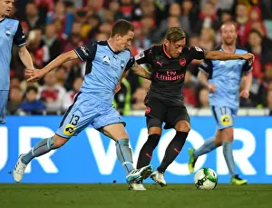Sydney FC V Arsenal - 2017-18 Prints: Mesut Ozil Outmaneuvers Brandon O'Neill: Sydney FC vs. Arsenal Pre-Season Clash