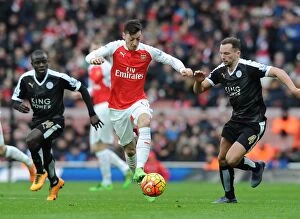 Images Dated 14th February 2016: Mesut Ozil Outmaneuvers Christian Fuchs: Arsenal vs Leicester City, Premier League 2015-16