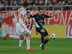 Olympiacos V Arsenal 2015-16 Prints: Mesut Ozil Outmaneuvers Dimitris Siovas
