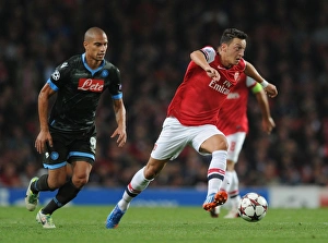 Arsenal V Napoli 2013-14 Prints: Mesut Ozil Outmaneuvers Gokhan Inler: Arsenal vs. Napoli, UEFA Champions League, 2013