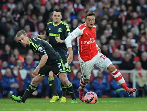 Arsenal V Middlesbrough - FA Cup 2014-15 Prints: Mesut Ozil Outmaneuvers Grant Leadbitter in FA Cup Clash: Arsenal vs. Middlesbrough