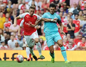 Mesut Ozil Outmaneuvers James Tomkins: Arsenal's Thrilling Start to 2015-16 Premier League Season