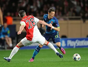 Monaco V Arsenal 2014/15 Prints: Mesut Ozil Outmaneuvers Jeremy Toulalan: Monaco vs