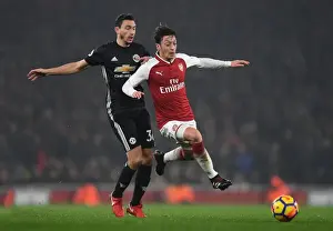 Arsenal V Manchester United 2017-18 Prints: Mesut Ozil Outmaneuvers Matteo Darmian: Arsenal vs Manchester United