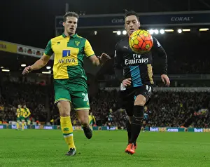 Norwich City V Arsenal 2015-16 Prints: Mesut Ozil Outmaneuvers Ryan Bennett: Premier League Showdown between Norwich and Arsenal (2015-16)