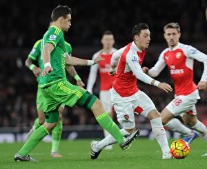 Images Dated 5th December 2015: Mesut Ozil Outmaneuvers Sebastian Coates: Arsenal vs Sunderland, Premier League 2015-16