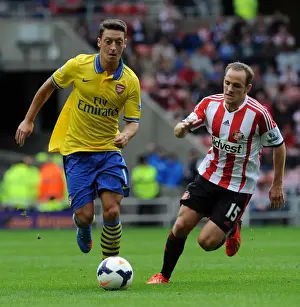 Sunderland V Arsenal 2013-14 Prints: Mesut Ozil Outpaces David Vaughan: Sunderland vs Arsenal, Premier League 2013-14