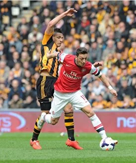 Hull City Collection: Mesut Ozil Outpaces Jake Livermore: Hull City vs. Arsenal, Premier League 2013/14
