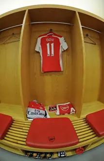 Arsenal V Tottenham Hotspur 2014-15 Prints: Mesut Ozil: Preparing for Battle in the Arsenal Dress - Arsenal v Tottenham Hotspur