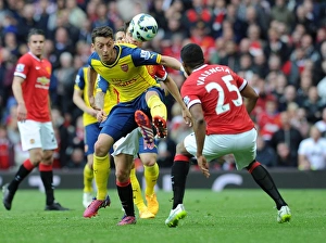 Manchester United V Arsenal 2014-15 Prints: Mesut Ozil Under Pressure: Herrera and Valencia Harass Arsenal Star in Manchester United vs Arsenal Clash (2014-15)