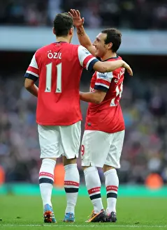 Arsenal V Norwich City 2013-14 Prints: Mesut Ozil and Santi Cazorla Celebrate Arsenal's Goals Against Norwich City