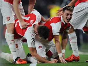 Arsenal V Bayern Munich 2015/16 Prints: Mesut Ozil Scores the Decisive Goal: Arsenal's Victory over Bayern Munich in the UEFA Champions League