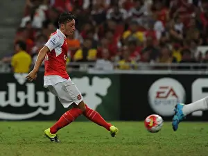Arsenal V Everton - Asia Trophy 2015-16 Prints: Mesut Ozil Scores His Third Goal: Arsenal Triumphs Over Everton in 2015 Asia Trophy Match