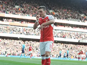Mesut Ozil Scores the Third Goal: Arsenal's Triumph over Swansea City (2016-17)