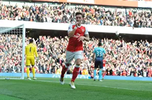 Mesut Ozil Scores the Third Goal: Arsenal's Triumph over Swansea City (2016-17)