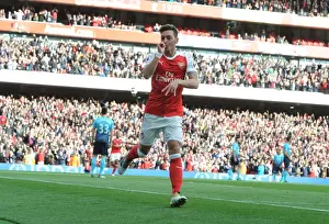 Mesut Ozil Scores the Third Goal: Arsenal's Triumph over Swansea City (Premier League 2016-17)