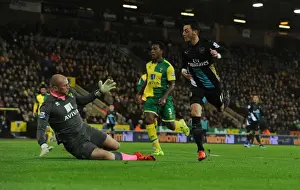 Norwich City V Arsenal 2015-16 Prints: Mesut Ozil Scores Spectacular Chip Against Norwich City: Arsenal's Victory in the Premier League 2015-16
