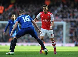 Arsenal Everton 2014-15 Prints: Mesut Ozil Takes on James McCarthy: Arsenal vs. Everton, Premier League 2014-15