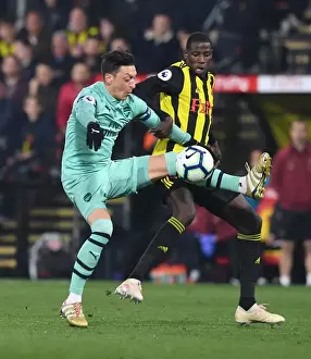 Mesut Ozil vs Abdoulaye Doucoure: A Premier League Showdown at Vicarage Road