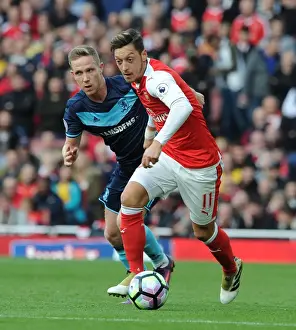 Mesut Ozil vs. Adam Forshaw: A Premier League Battle at Emirates Stadium (2016-17)