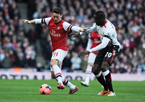 Arsenal V Liverpool - FA Cup 2013-14 Prints: Mesut Ozil vs. Aly Cissokho: Arsenal vs. Liverpool FA Cup Clash