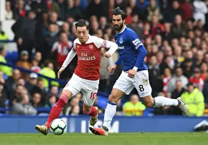 Everton V Arsenal 2018-19 Prints: Mesut Ozil vs. Andre Gomes: A Midfield Duel at Goodison Park - Arsenal vs