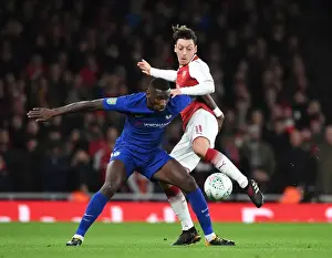 Arsenal V Chelsea - Carabao Cup 2017-18 Prints: Mesut Ozil vs. Antonio Rudiger: Carabao Cup Semi-Final Showdown at Arsenal's Emirates Stadium