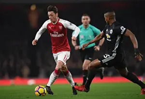 Arsenal V Manchester United 2017-18 Prints: Mesut Ozil vs. Antonio Valencia: Battle at the Emirates - Arsenal vs