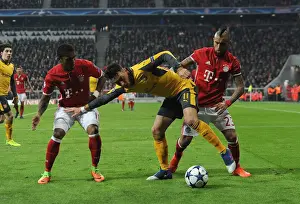 Bayern Munich V Arsenal 2016-17 Prints: Mesut Ozil vs. Bayern's Defense: A Tactical Battle in the UCL First Leg, Munich 2017