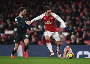 Arsenal V Manchester City 2017-18 Prints: Mesut Ozil vs Bernardo Silva: Intense Battle at the Emirates - Arsenal vs Manchester City