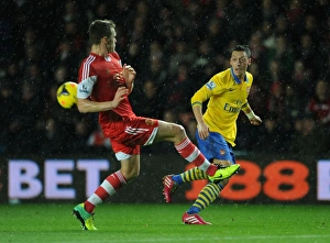 Southampton V Arsenal 2013-14 Prints: Mesut Ozil vs Calum Chambers