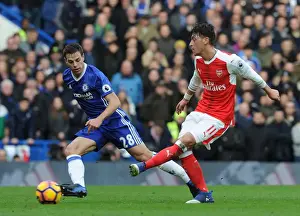 Chelsea V Arsenal 2016-17 Prints: Mesut Ozil vs Cesar Azpilicueta: A Football Rivalry at Stamford Bridge - Premier League 2016-17