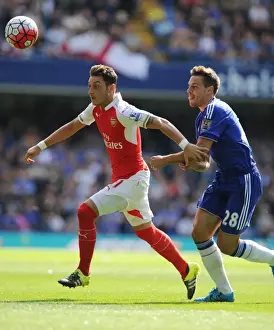 Chelsea V Arsenal 2015-16 Prints: Mesut Ozil vs Cesar Azpilicueta: A Premier League Showdown at the Emirates