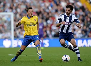 West Bromwich Albion V Arsenal 2013-14 Prints: Mesut Ozil vs Claudio Yacob: A Premier League Battle